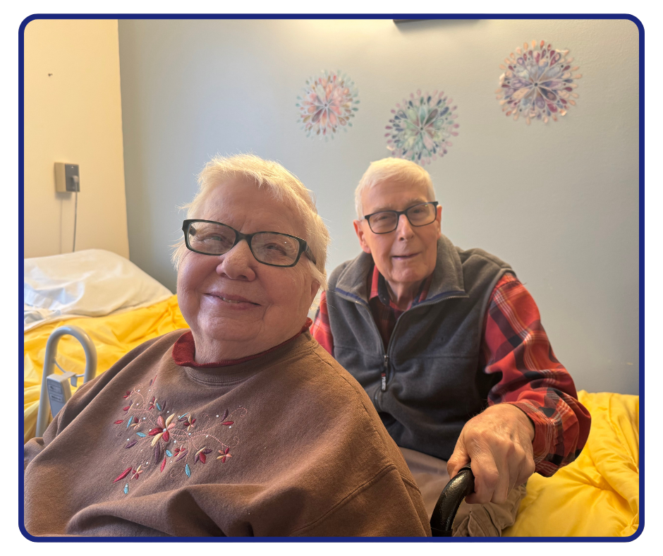 John and Toni smiling.